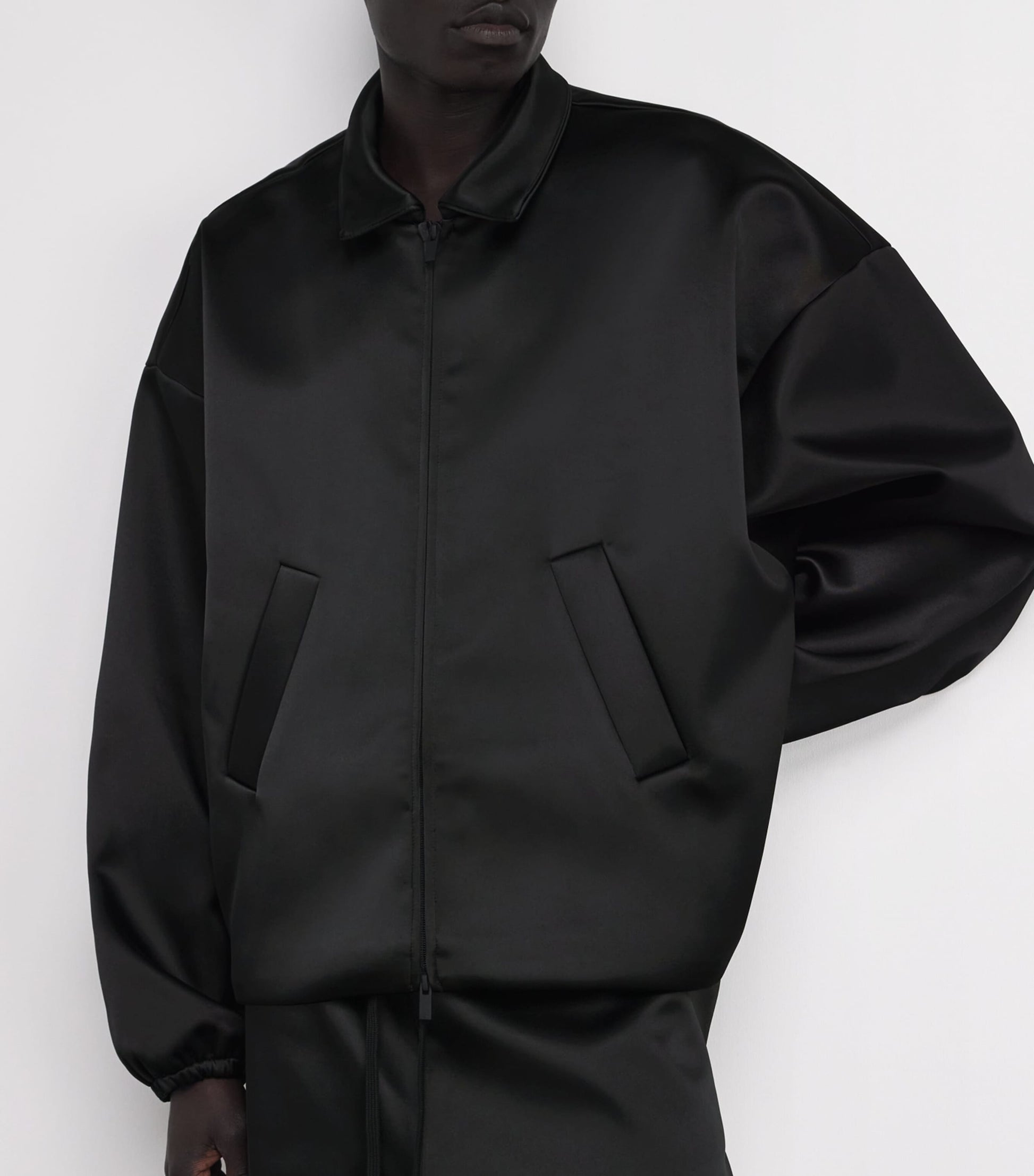 FEAR OF GOD ESSENTIALS Black Bonded Satin Bomber Jacket