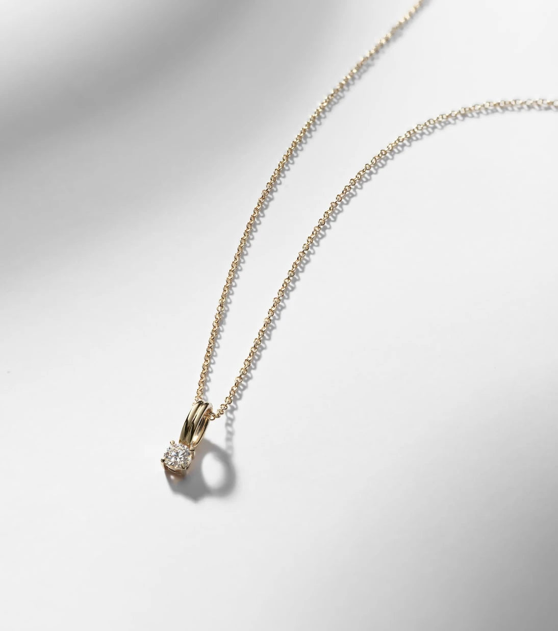 Stone and Strand - 14kt gold charm necklace with diamonds
