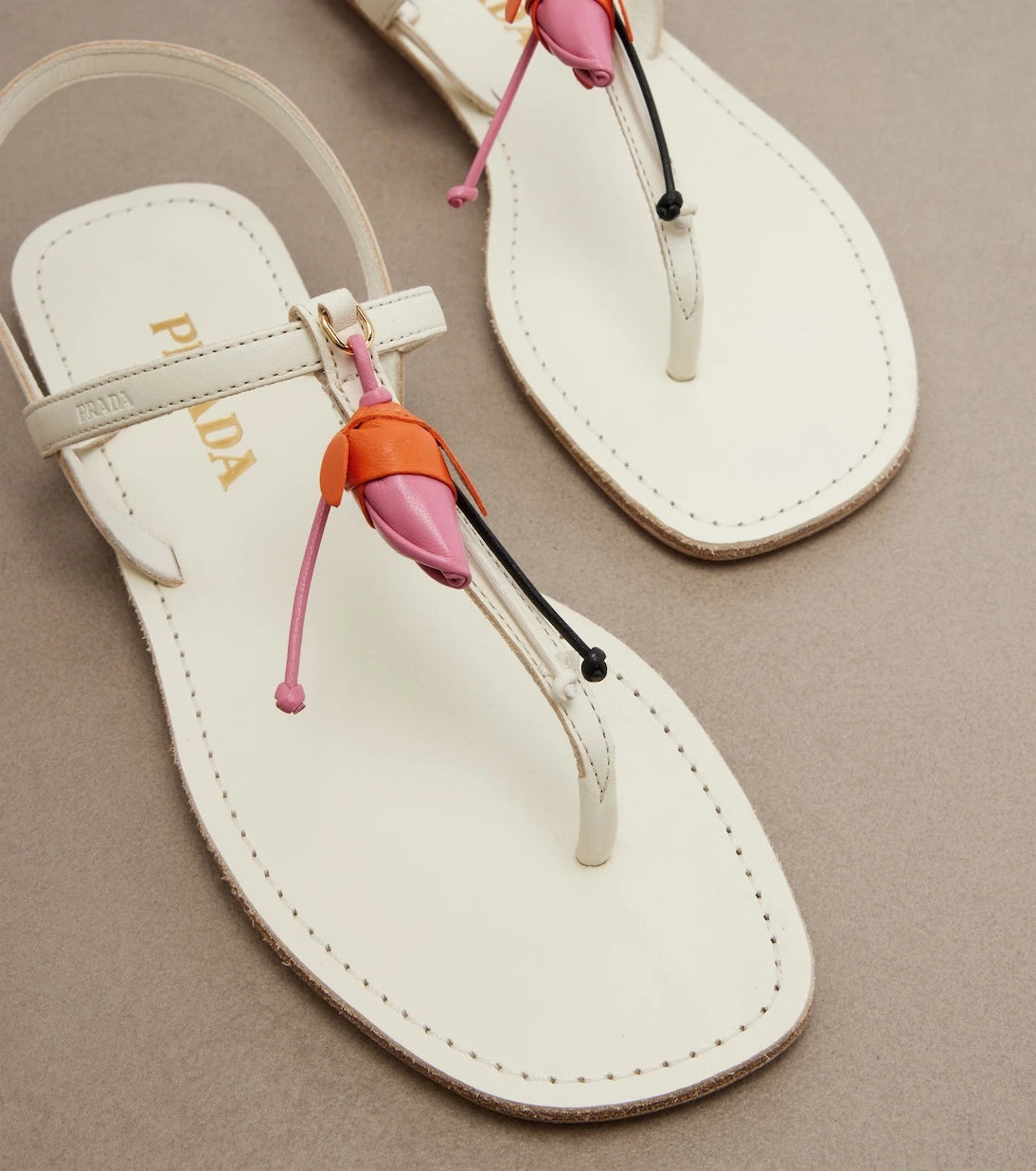 Prada - Floral-appliqué leather thong sandals