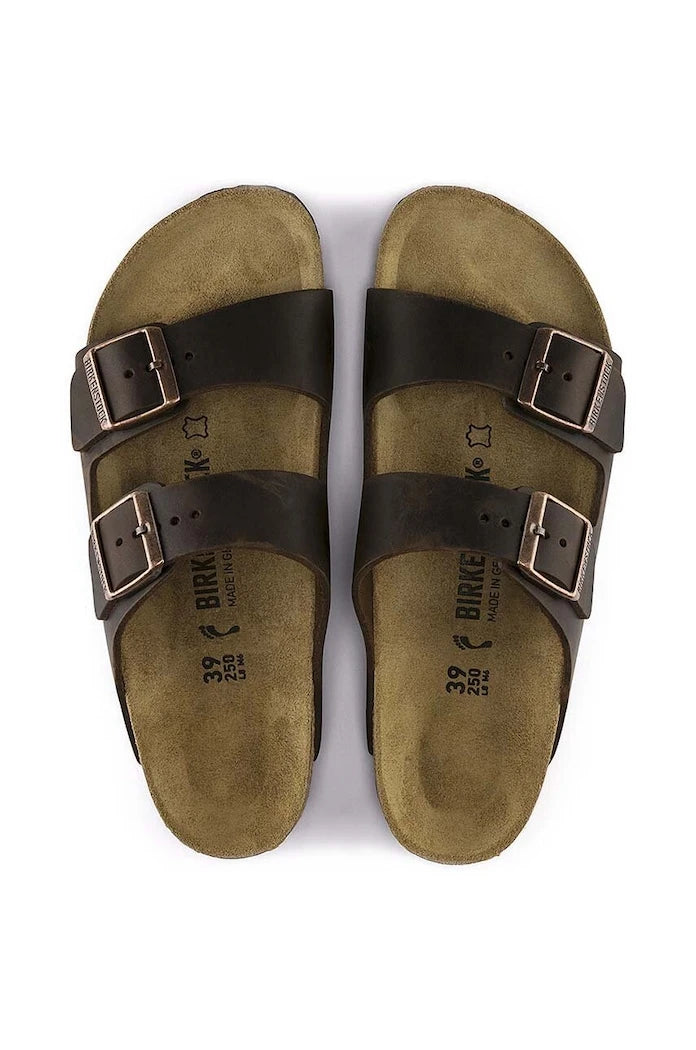 Birkenstock düz tabanlı deri Arizona terlikler