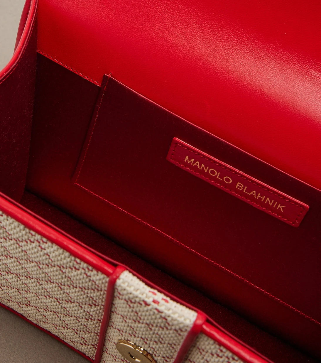 Manolo Blahnik - Maycap raffia-effect clutch