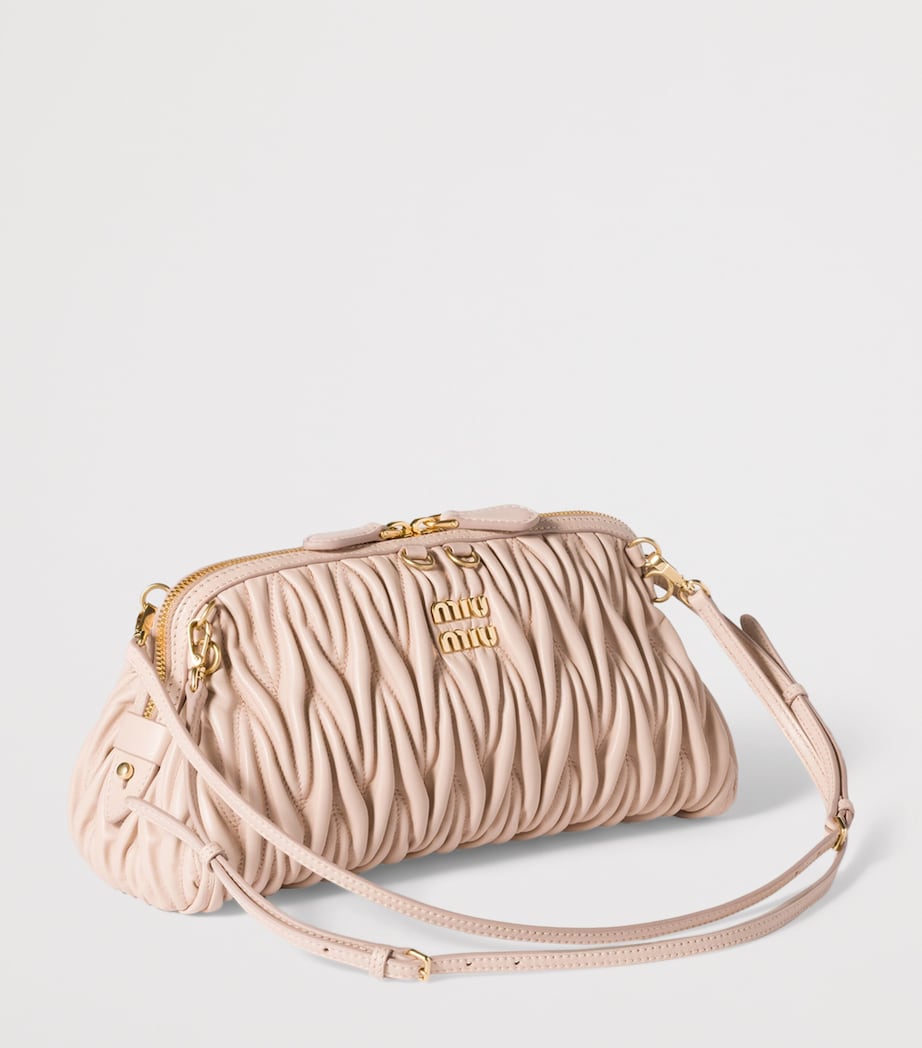 Matelassé Leather Clutch Bag