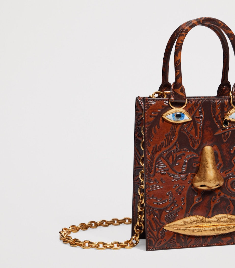 Mini Etched-Leather Face Top-Handle Bag