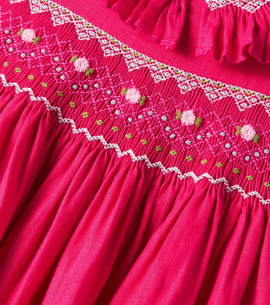 La Coqueta - Embroidered smocked linen dress