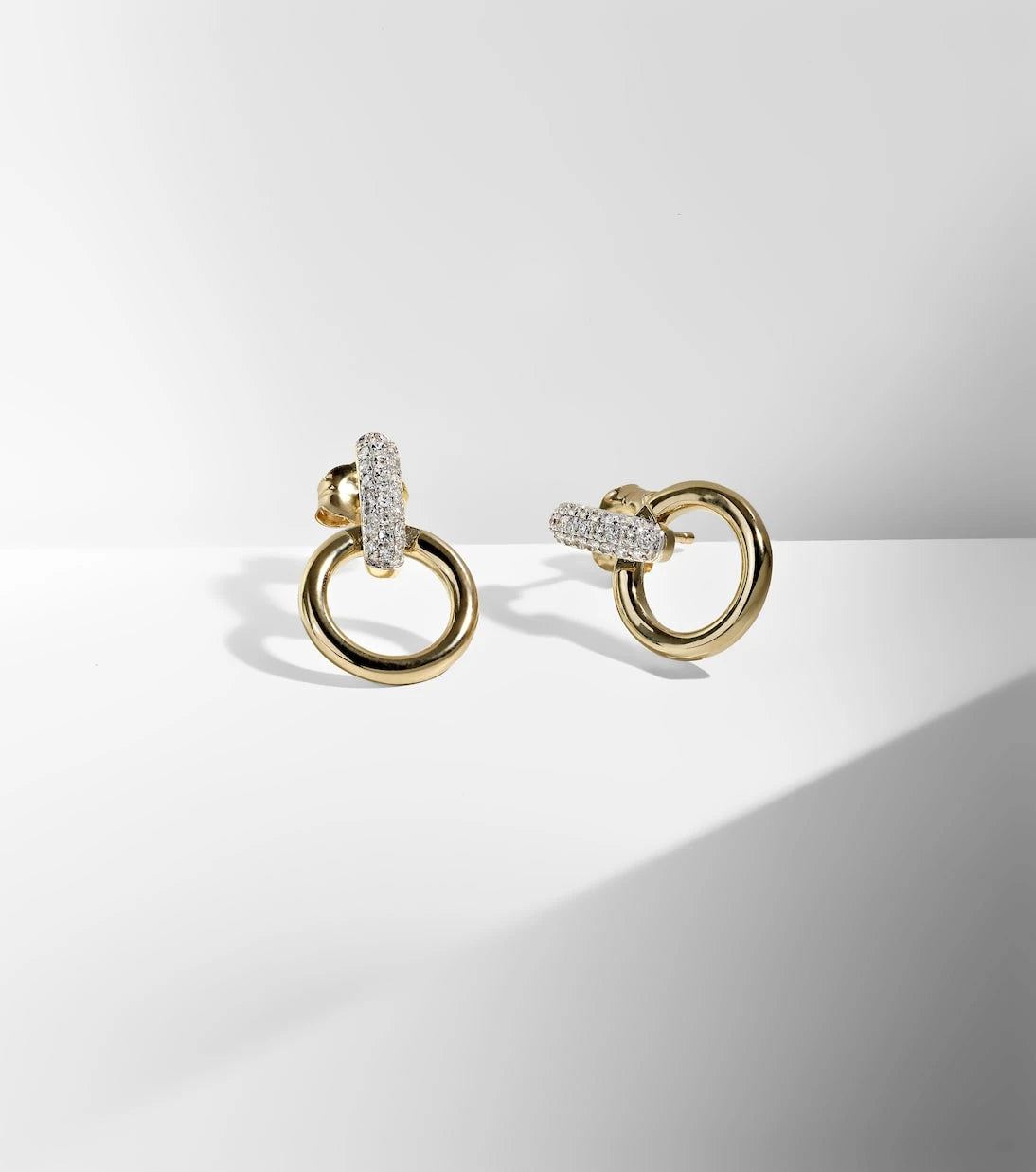 Stone and Strand - Horsebit 14kt gold earrings with diamonds