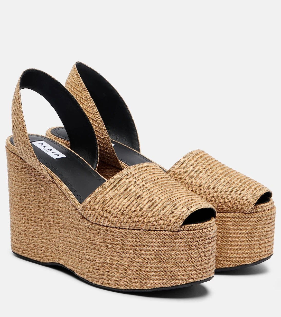 Alaïa - Straw wedge sandals