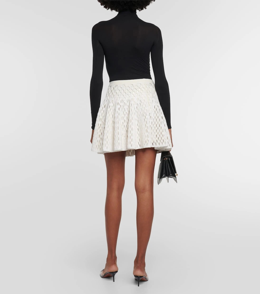 Alaïa - تنورة قصيرة محبوكة بخصر مرتفع