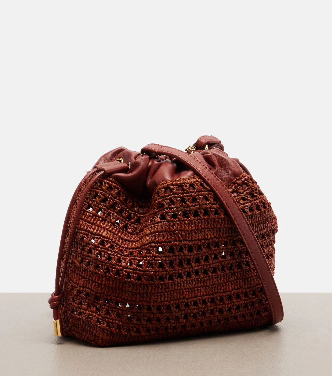 Chloé - Mini leather-trimmed raffia bucket bag