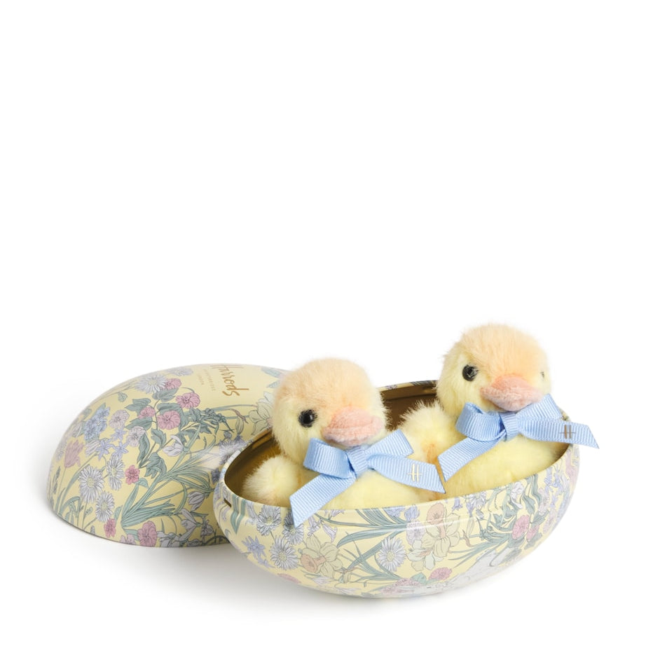 Plush Chicks in a Tin Egg