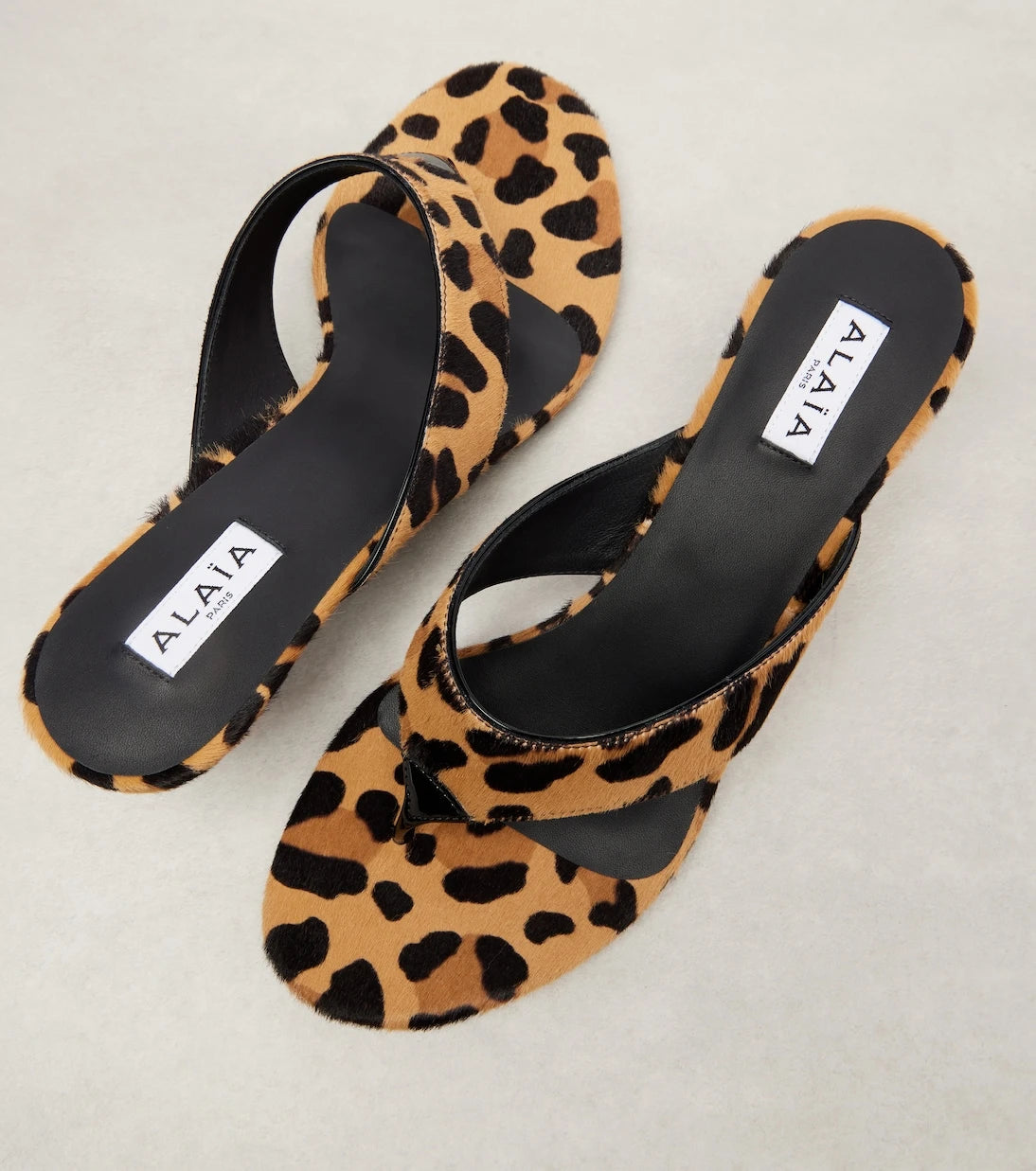 Alaïa - صندل ثونغ 55 من جلد العجل