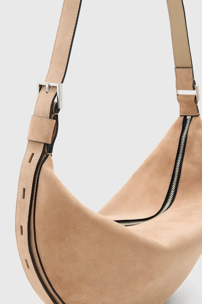 Велурена чанта AllSaints HALFMOON