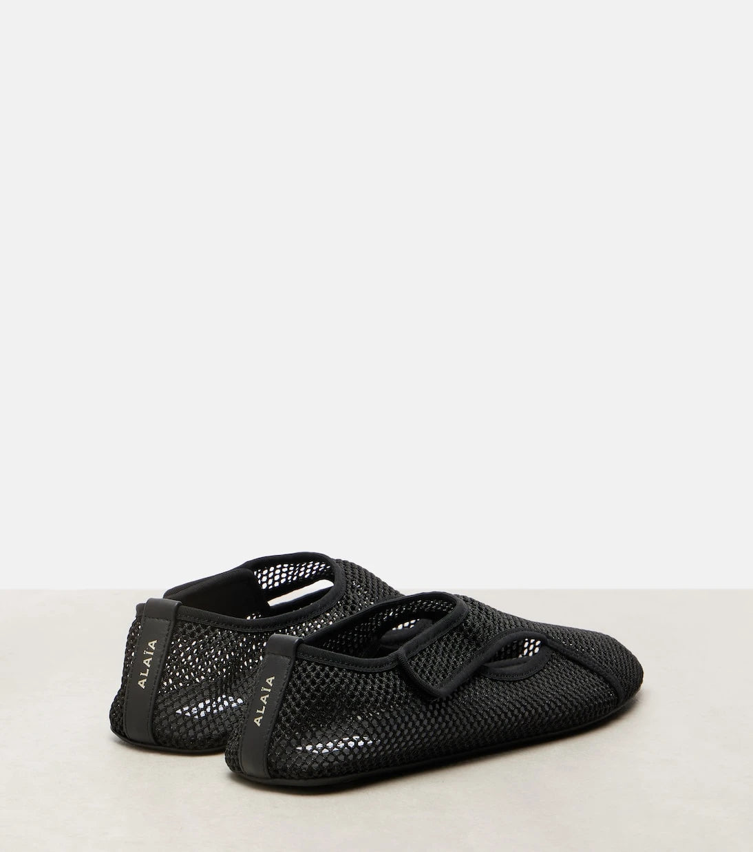 Alaïa - Fishnet slip-on shoes