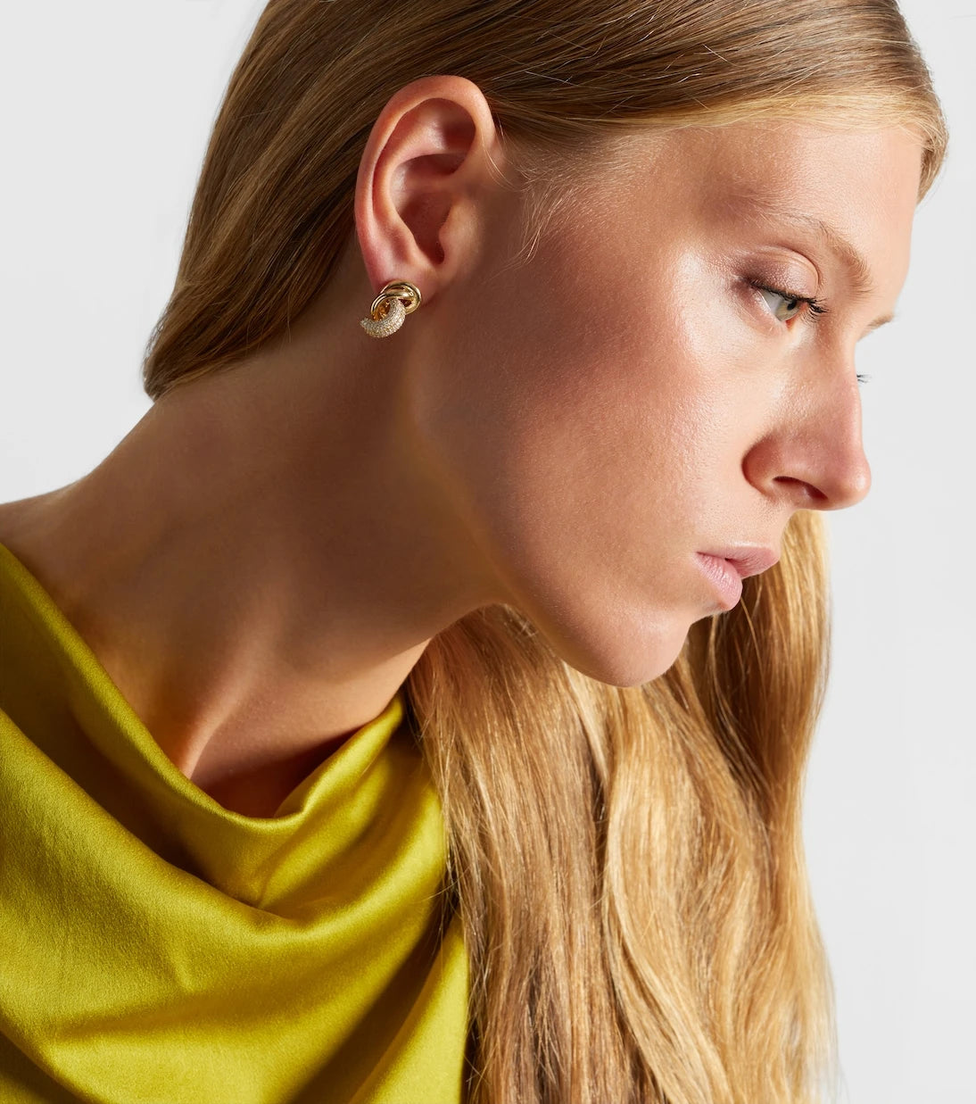 Stone and Strand - 14kt gold earrings with diamonds