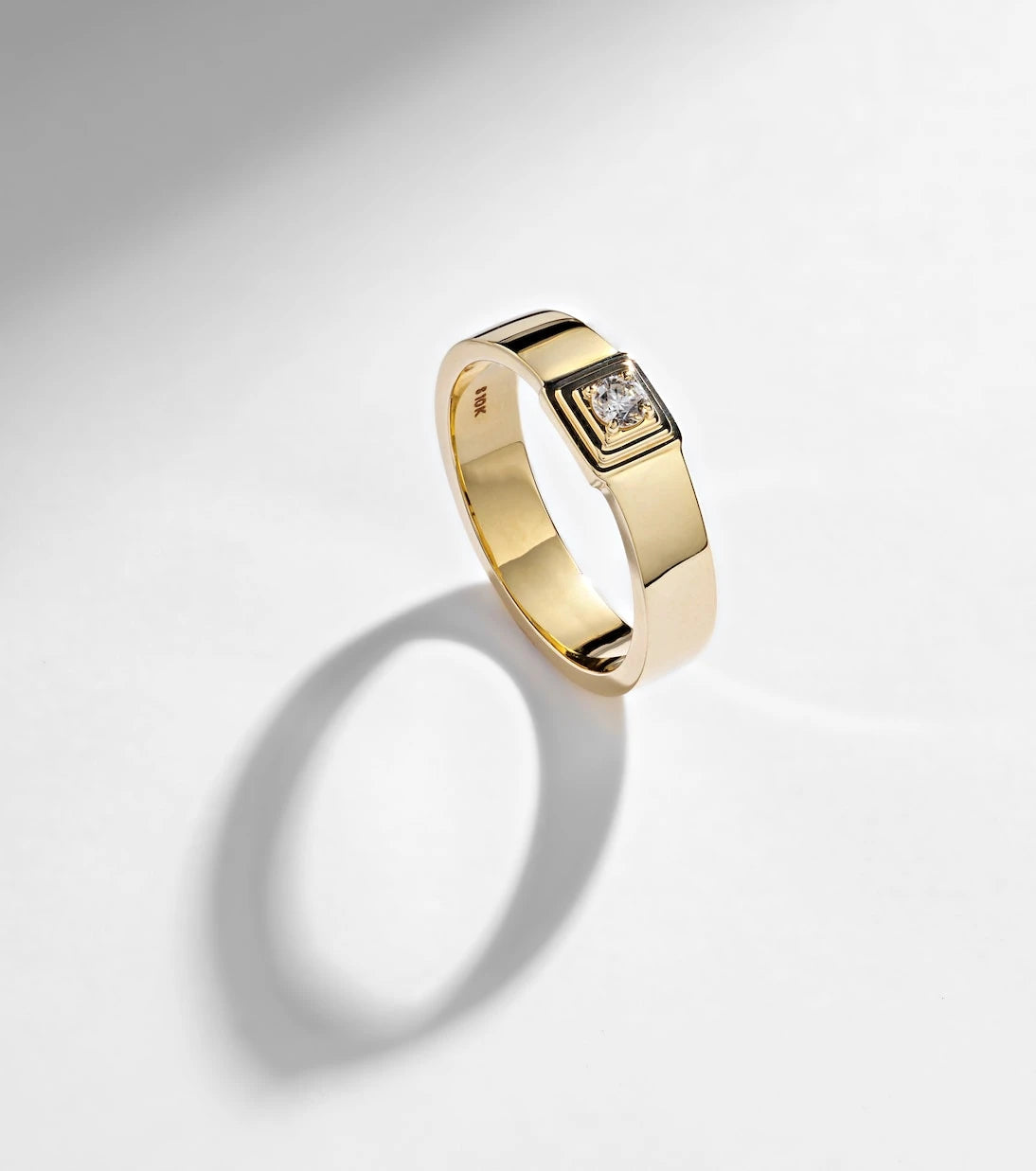 Stone and Strand - 10kt gold ring with diamonds
