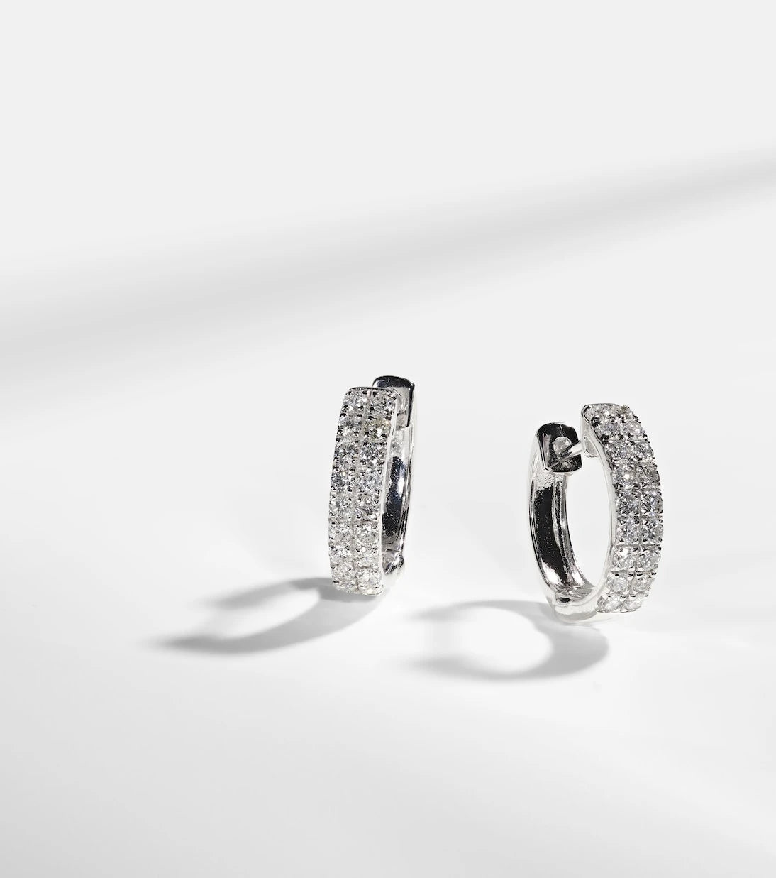 Stone and Strand - 14kt white gold earrings with diamonds