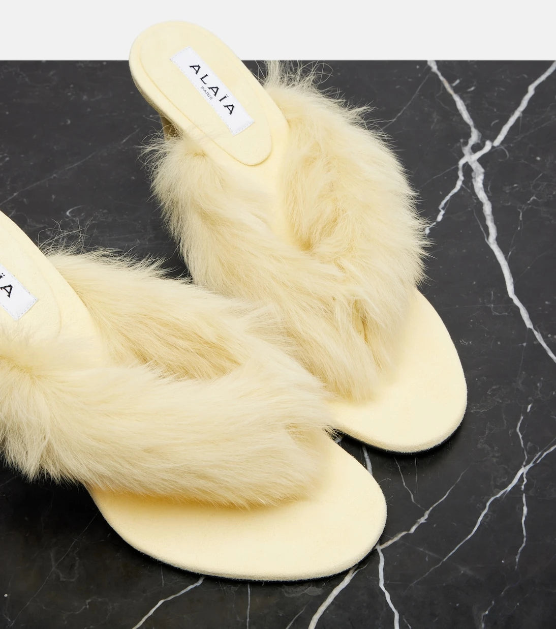 Alaïa - Shearling and leather thong sandals