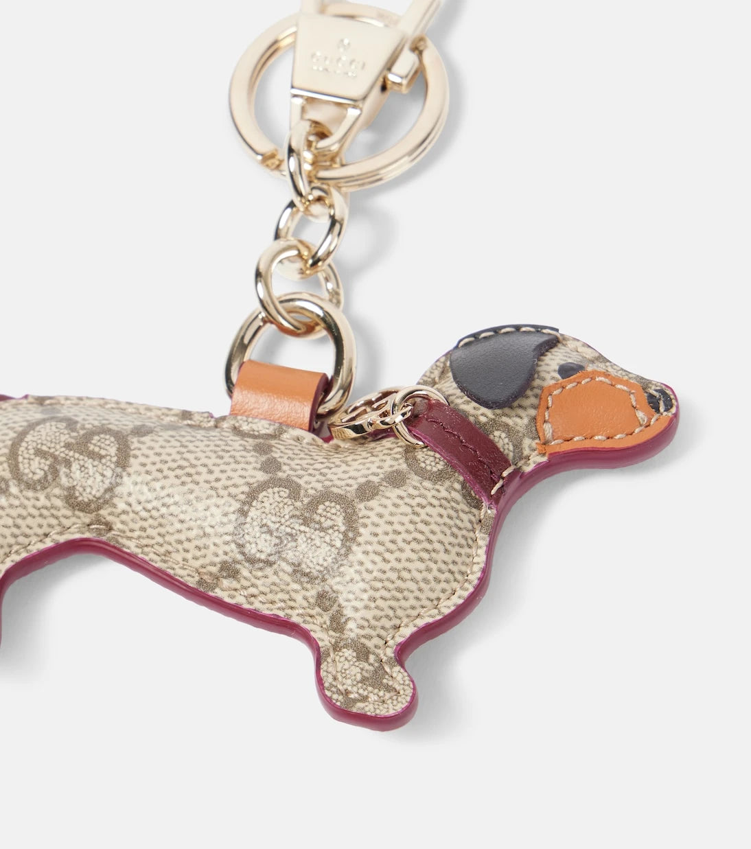 Gucci - ميدالية مفاتيح GG Canvas مزينة بالجلد