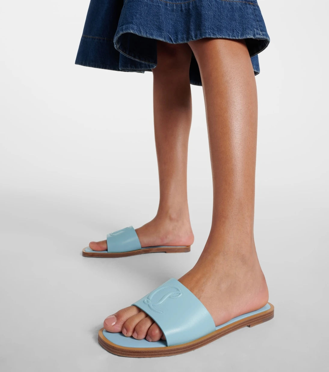 Christian Louboutin - CL embossed leather mules