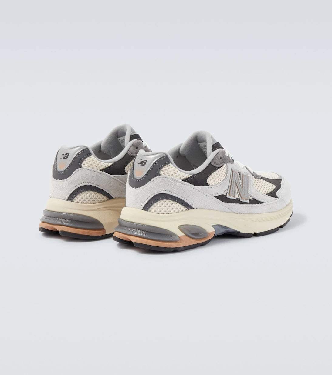 New Balance - حذاء رياضي شبكي وجلد سويدي 2010