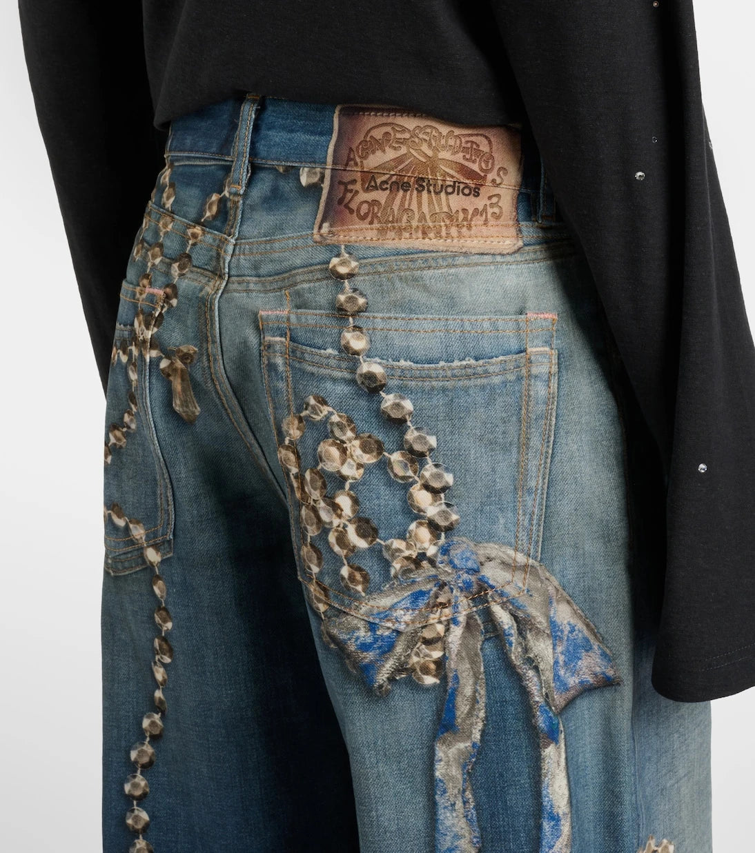 Acne Studios - جينز واسع الساقين بنقشة ترومبي لويل 1981