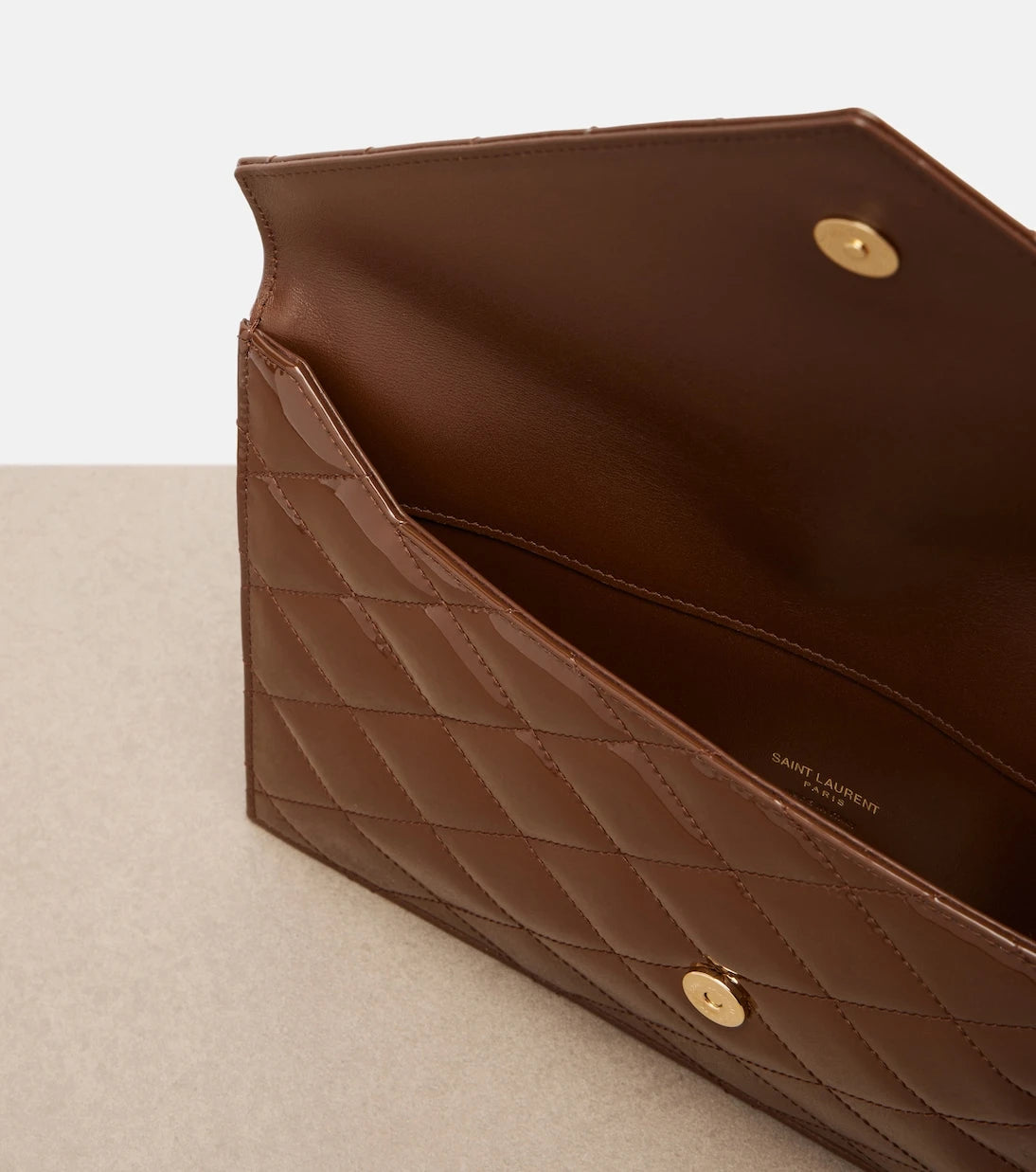 Saint Laurent - Paris quilted patent leather pouch