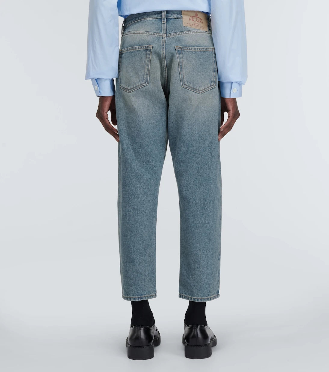 Prada - Distressed mid-rise tapered jeans