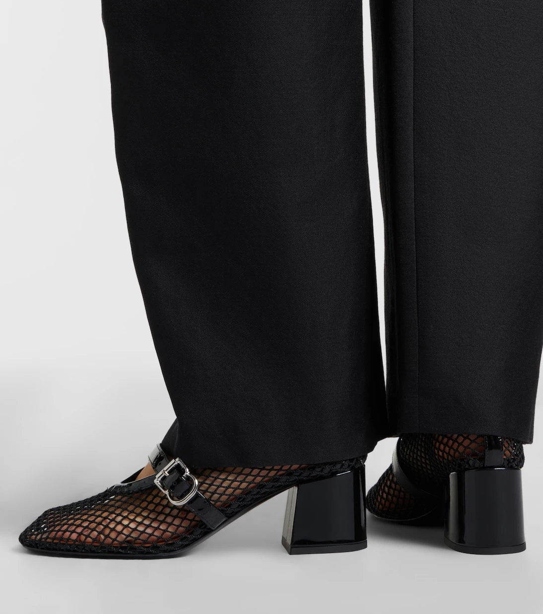 Alaïa - Fishnet leather-trimmed Mary Jane pumps