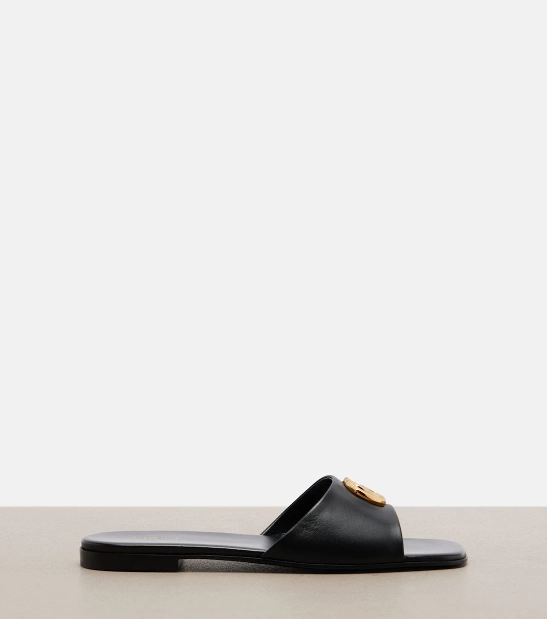 Gucci - Double G leather slides