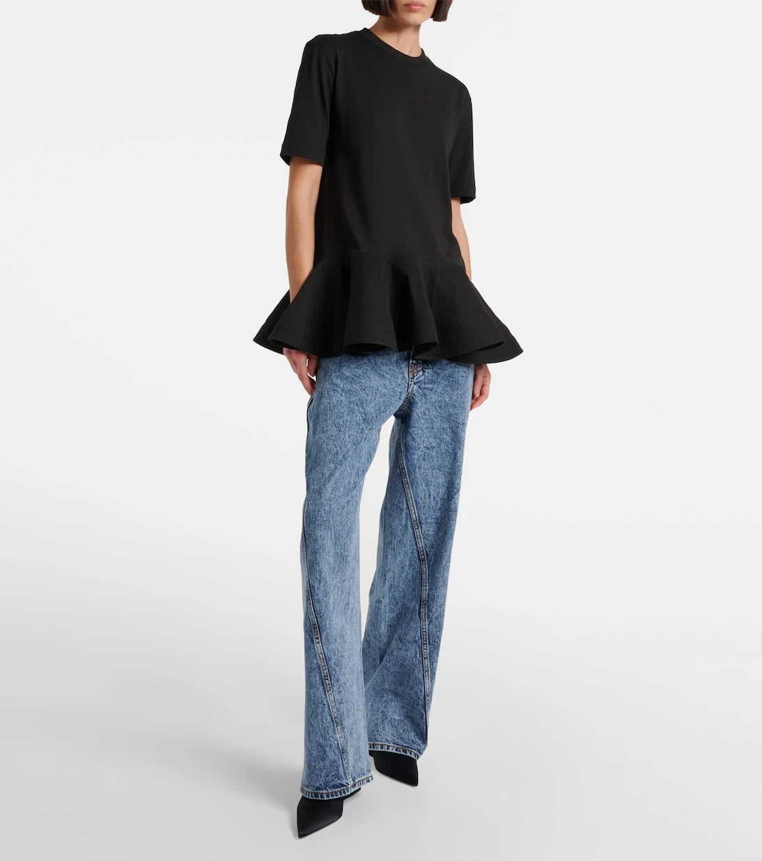 Alaïa - جينز بساق واسعة وخصر منخفض وملتف