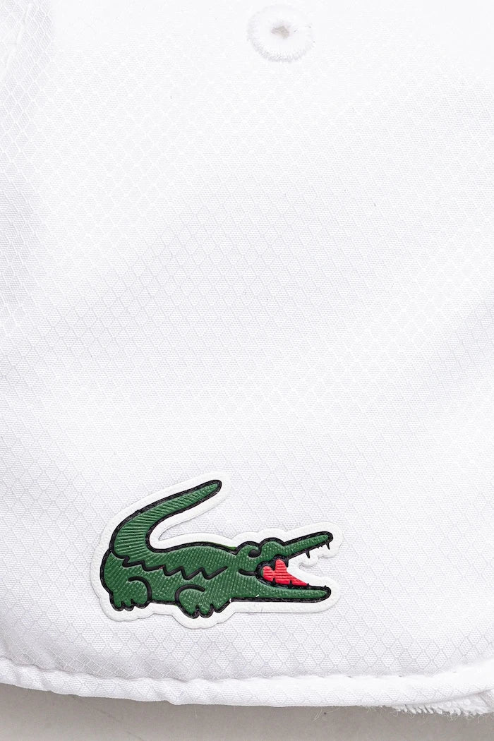 Шапка с козирка Lacoste