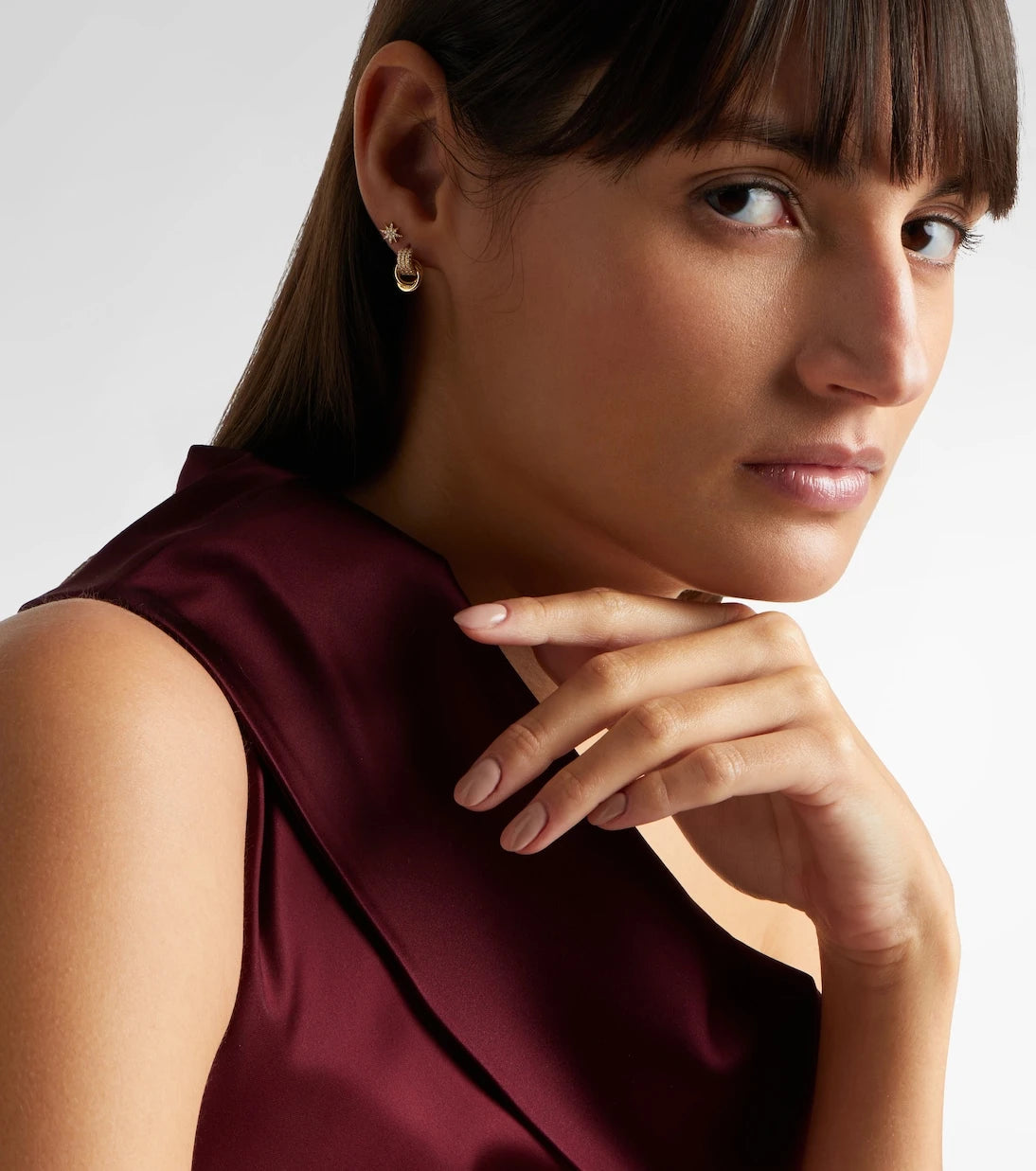 Stone and Strand - Forme Knot 14kt gold earrings with diamonds