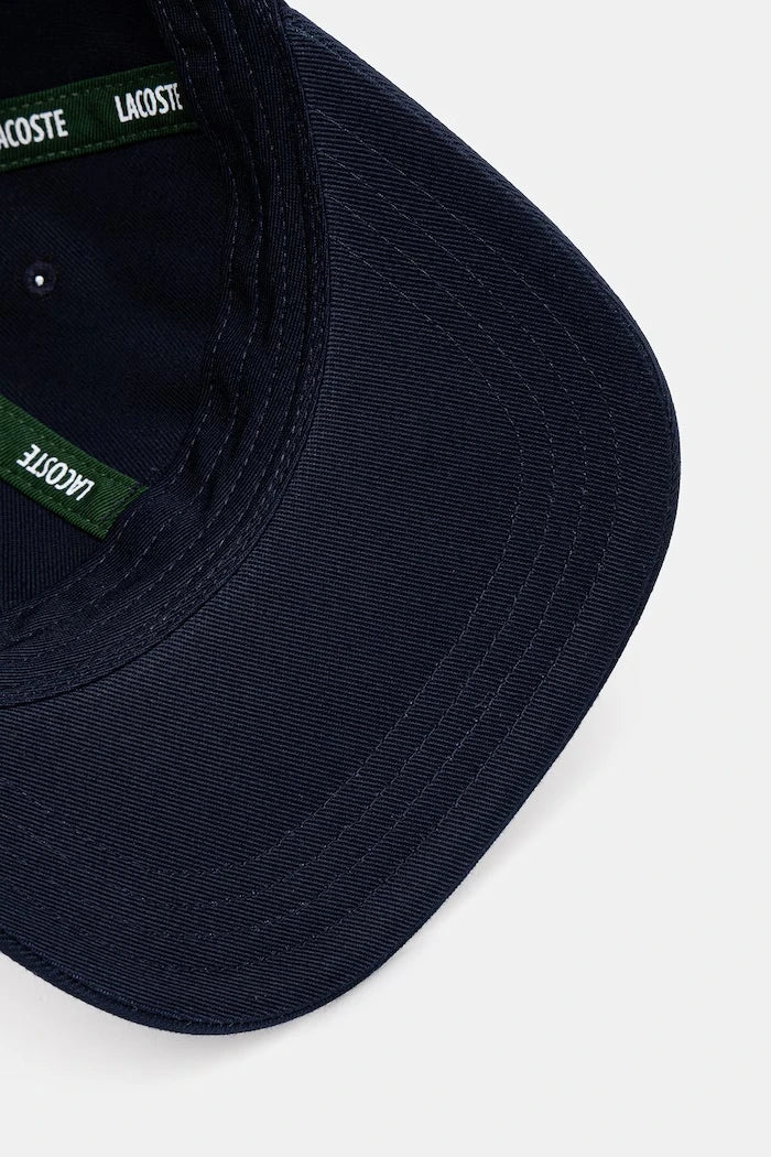Lacoste шапка с козирка от памук