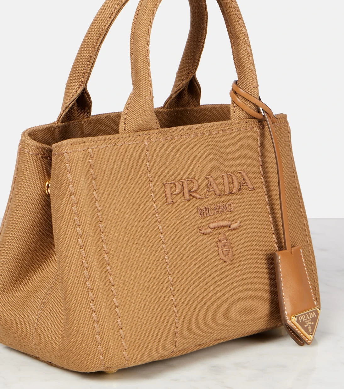 Prada - حقيبة يد قماشية صغيرة برادا جاردينيير