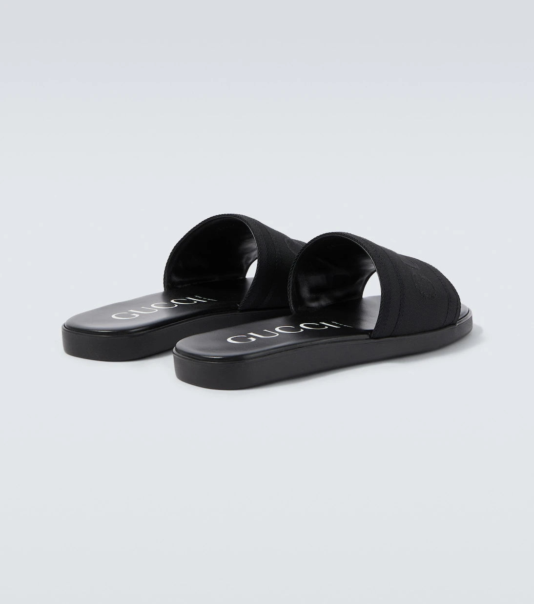 Gucci - Logo canvas and leather slides