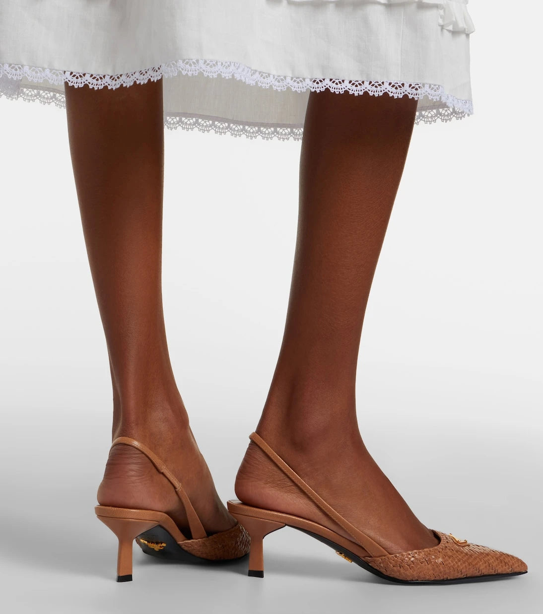 Prada - Woven leather slingback pumps
