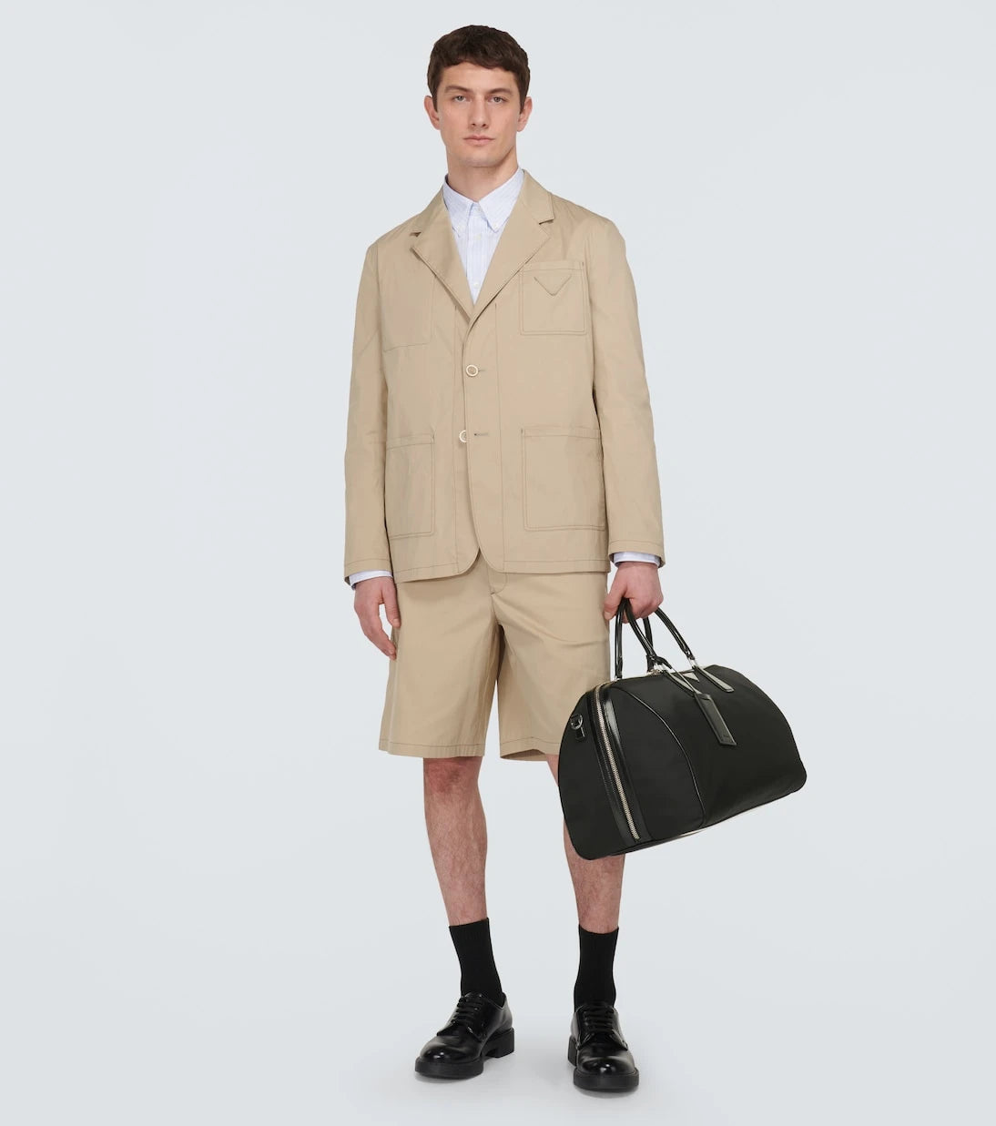 Prada - Leather-trimmed duffel bag