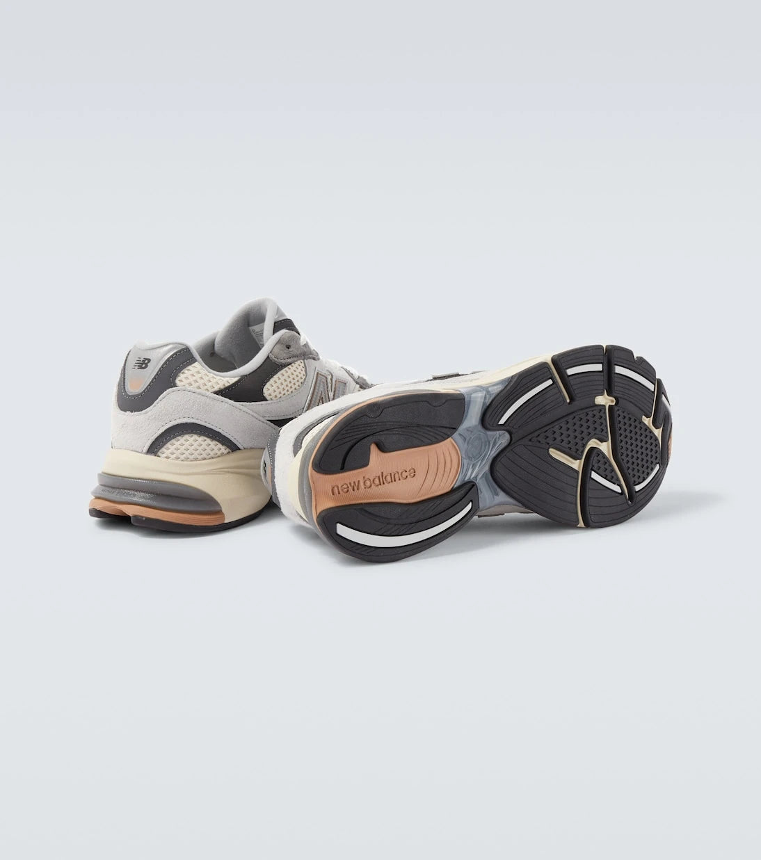 New Balance - حذاء رياضي شبكي وجلد سويدي 2010