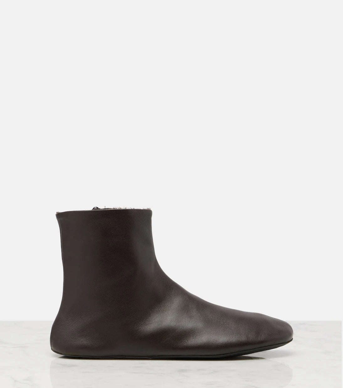 The Row - Stella shearling-lined leather ankle boots
