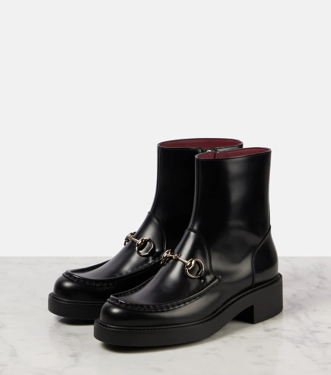 Gucci - جزمة الكاحل من الجلد هورسبِت