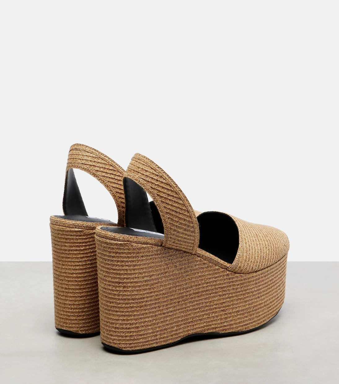 Alaïa - Straw wedge sandals