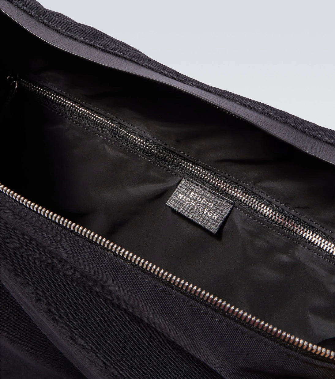 Studio Nicholson - Airport leather-trimmed tote bag