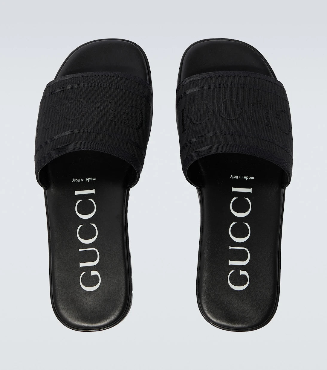 Gucci - Logo canvas and leather slides