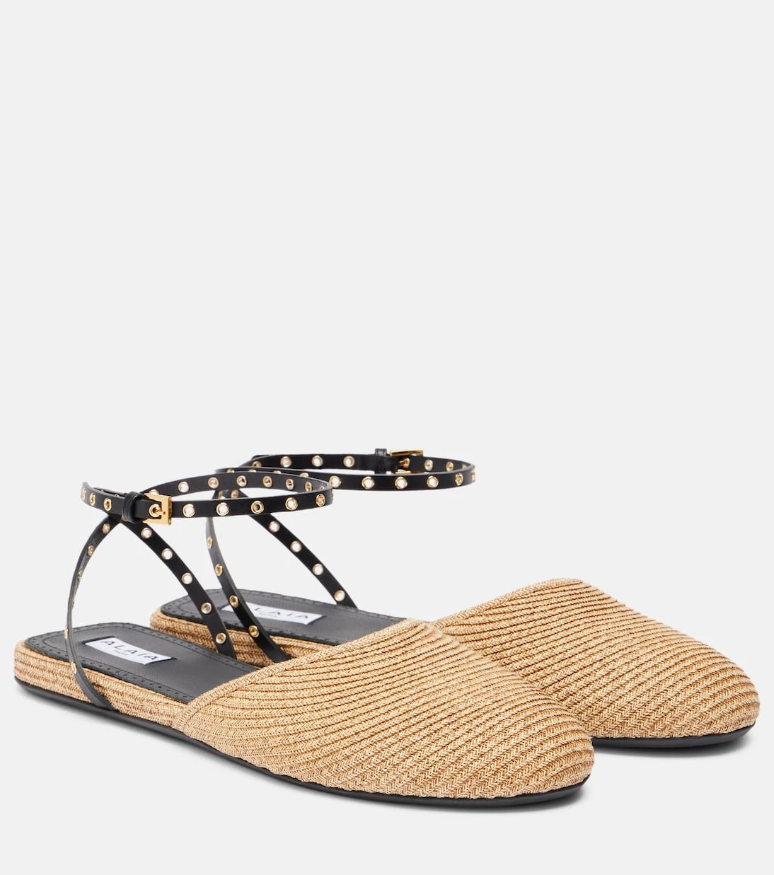 Alaïa - Leather-trimmed raffia flats
