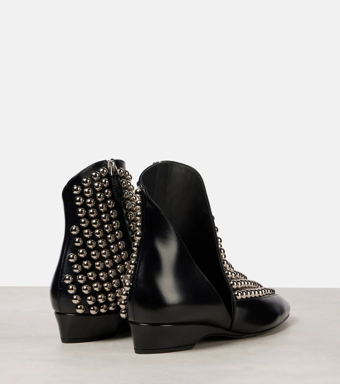 Alaïa - Studded leather ankle boots
