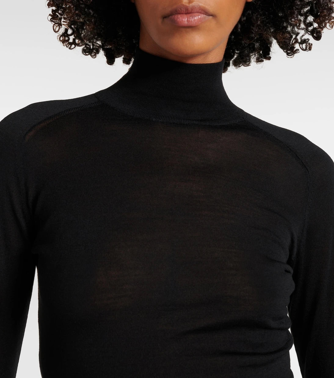 Alaïa - Faux fur-trimmed wool turtleneck top