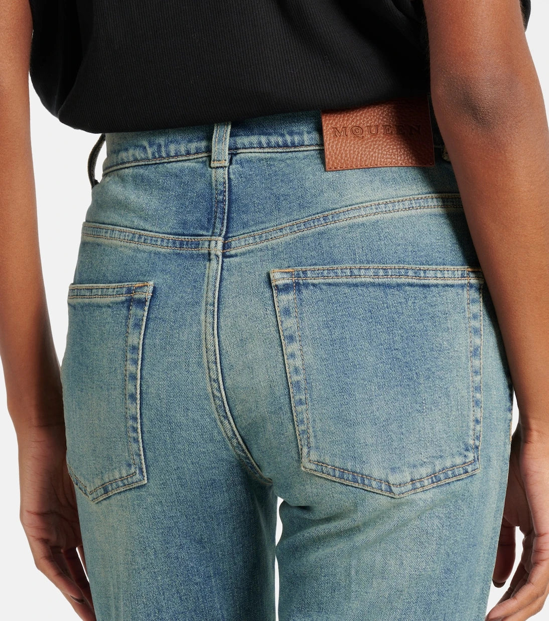 McQueen - Faded flared jeans