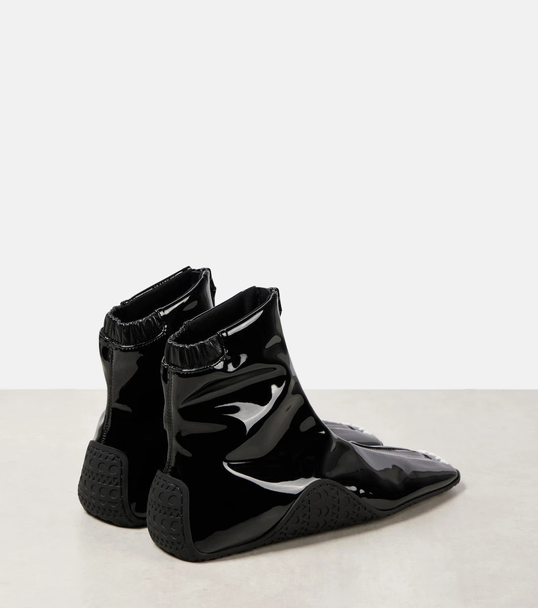 Alaïa - Sneaker faux patent leather ankle boots