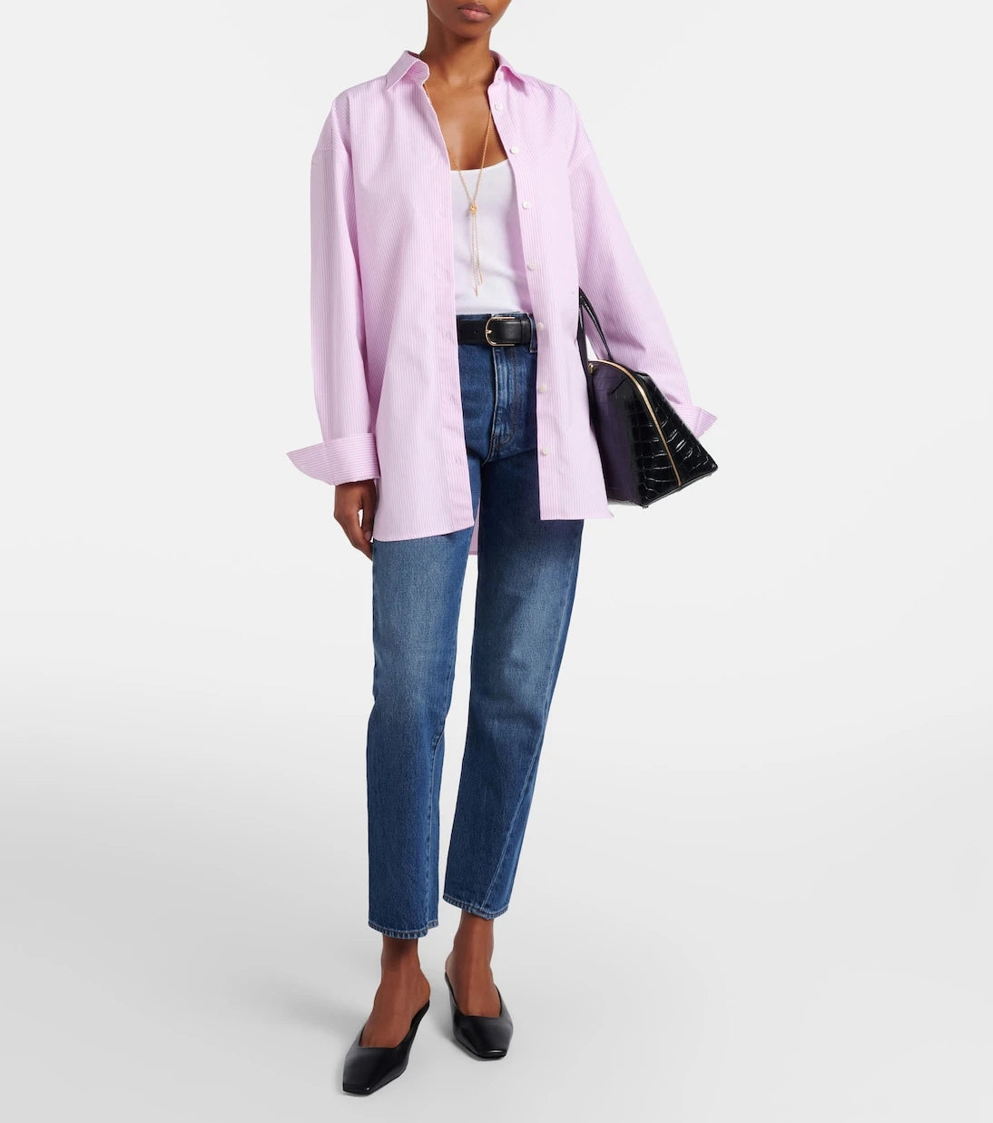 Toteme - Mid-rise twisted-seam straight jeans