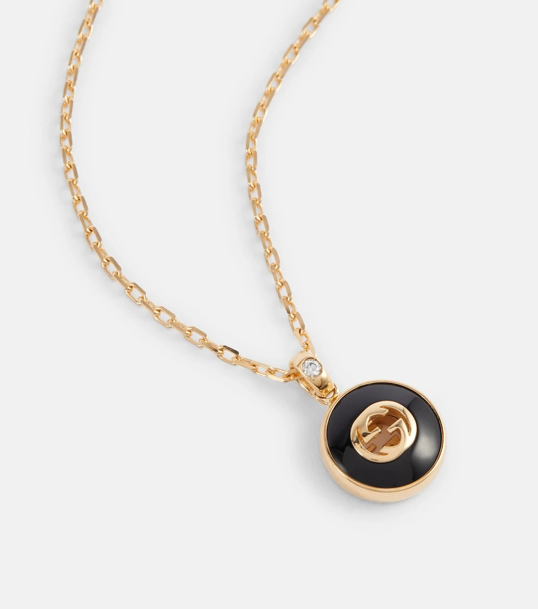 Gucci - Interlocking G 18kt gold necklace with onyx and diamond