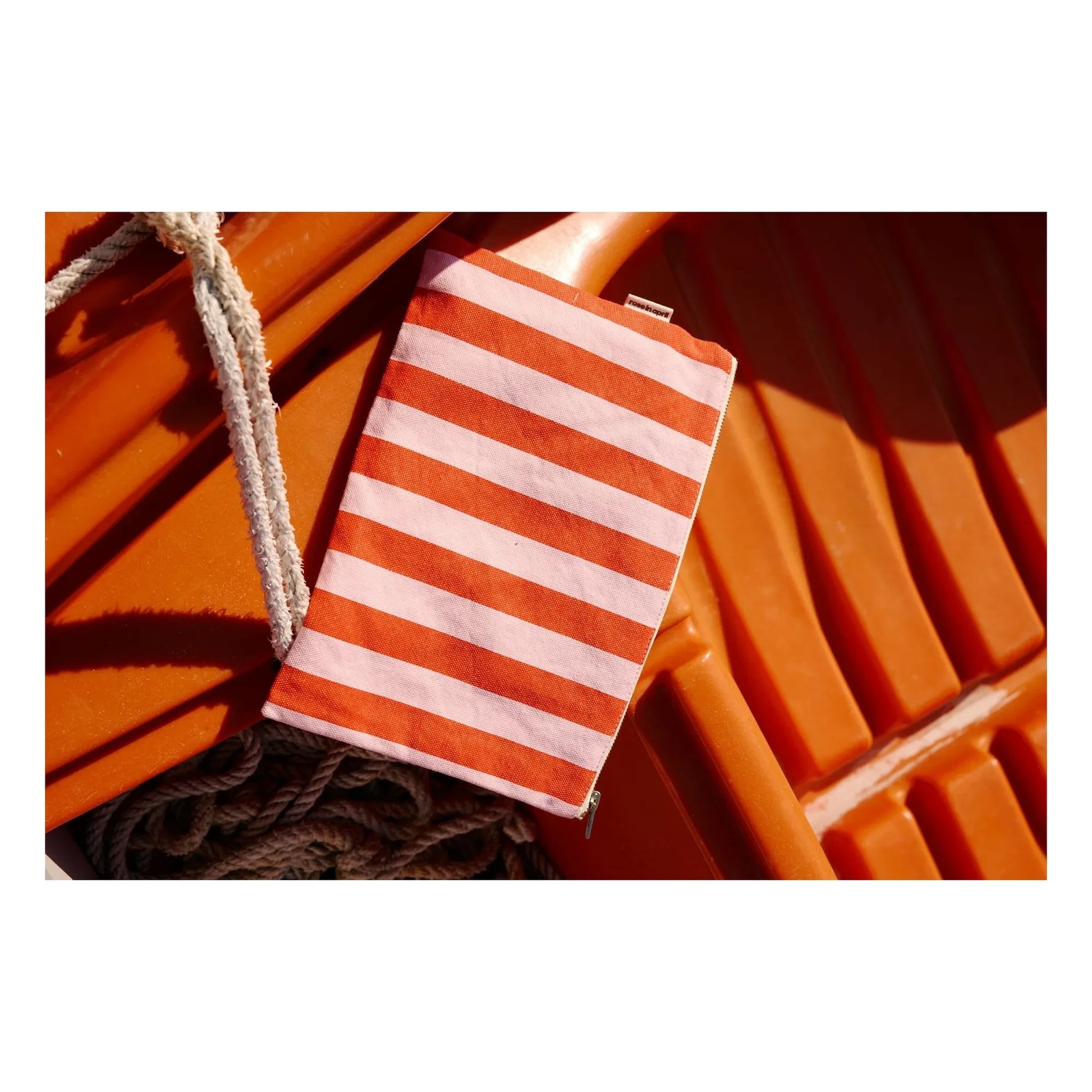 Rose in April - Lili striped clutch bag | Red